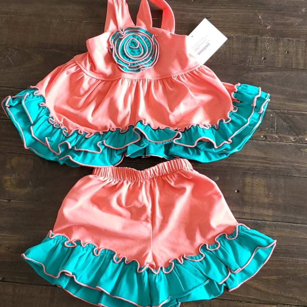 Millie Jay ruffle short outfit